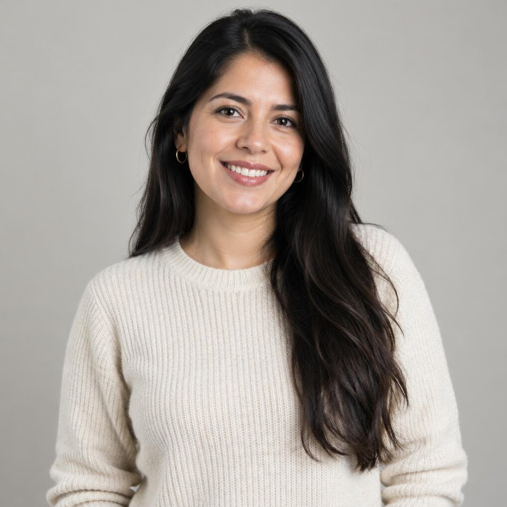 Portrait of a woman with dark hair smiling